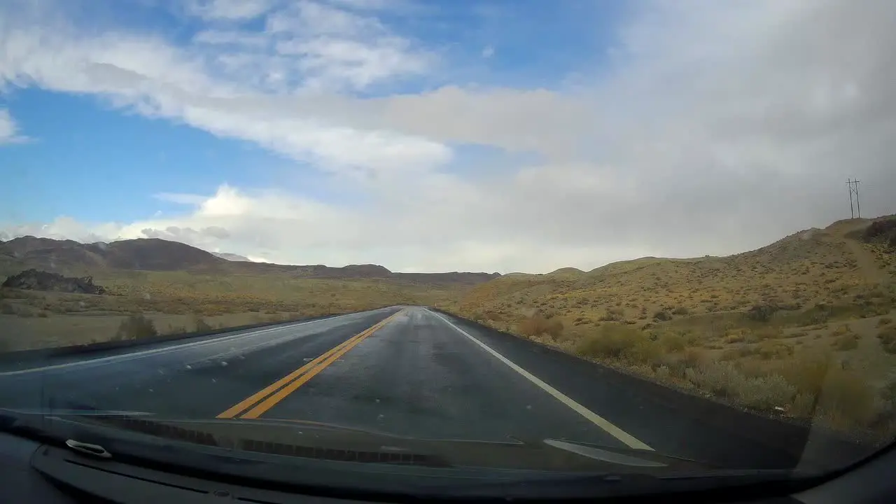 driving on winding canyon road