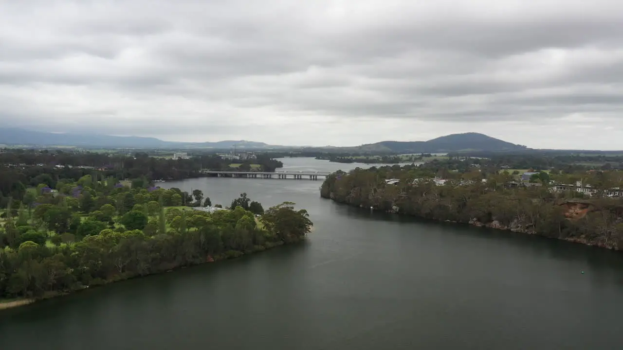 Aerial drone shot over the shoal haven river towards Nowra on a stormy day in south coast NSW Australia