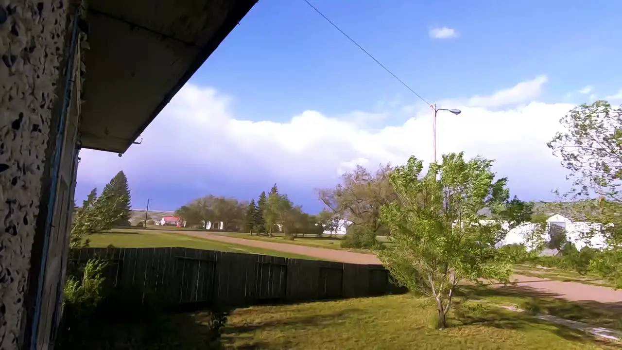 Front yard of a home in the country during a storm