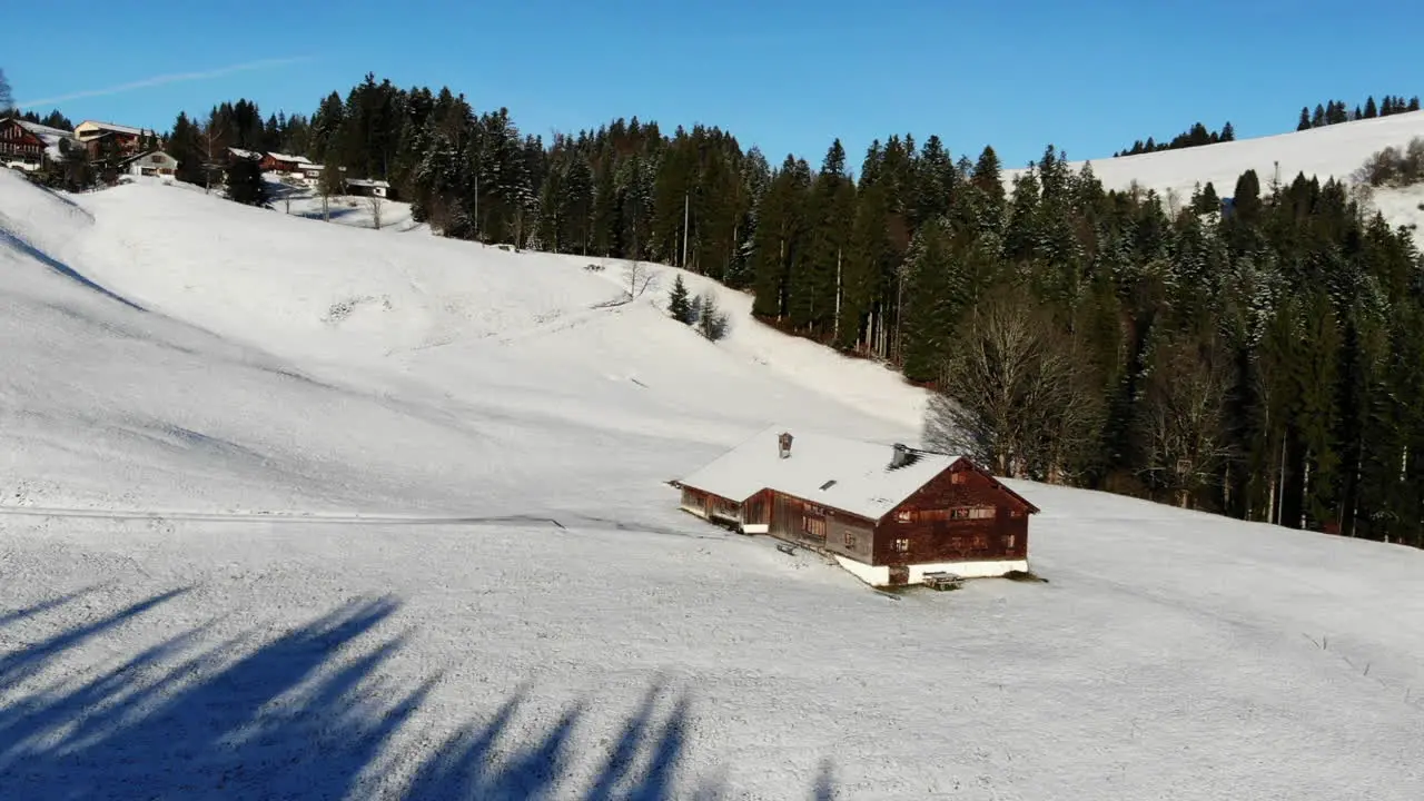 areal footage of an old farm house in Schwarzenberg Bregenzerwald