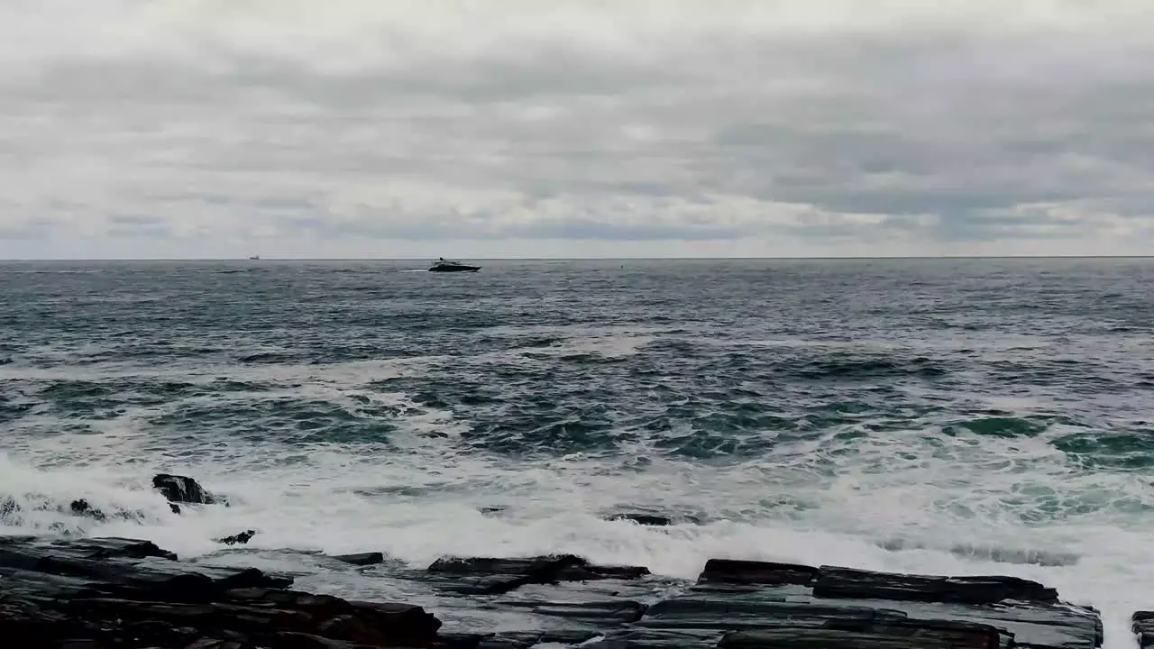 Surf Warnings were up at Two LIghts State Park in Cape Elizabeth Me with yacht in distance