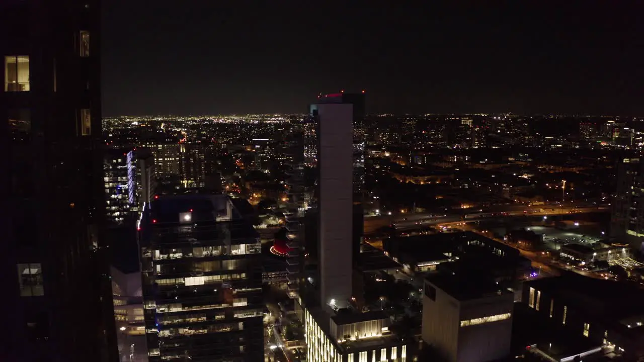 Aerial view of the downtown Dallas Texas skyscrapers lit up at night