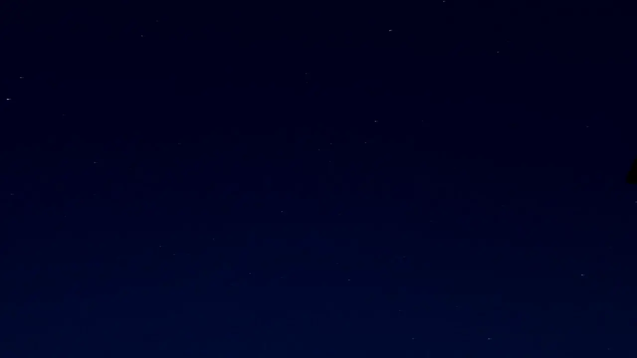 The night sky taken on a time lapse stars and planets move past-2