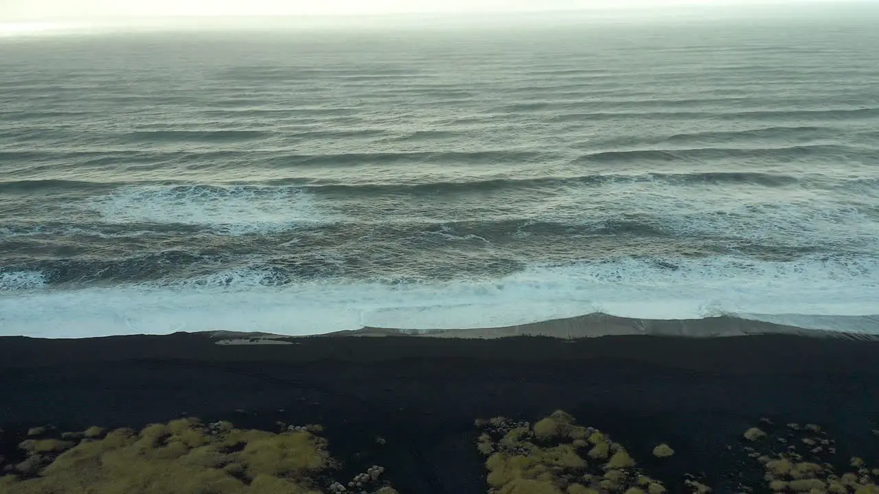 Waterfront seascape in a black sand cursed beach Iceland terrifying destination