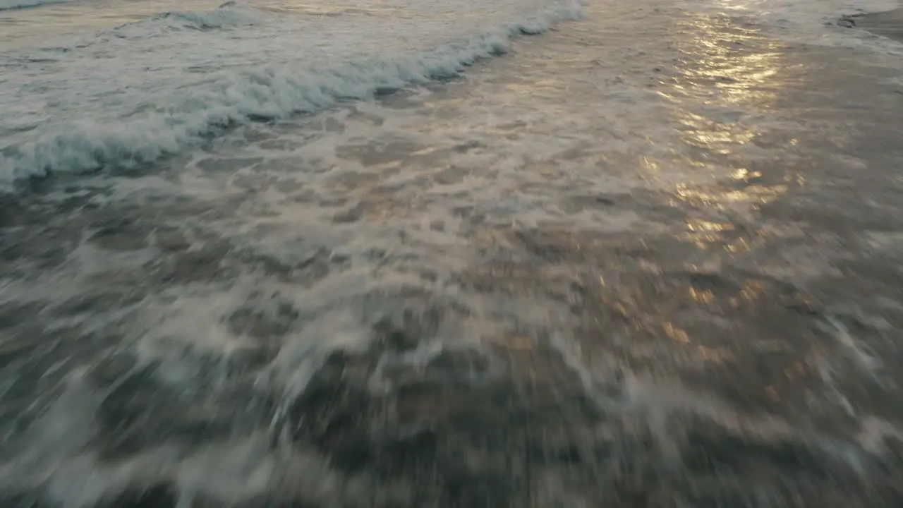 Low Fly Over Breaking Foamy Waves During Dusk At El Paredón Buena Vista Escuintla Guatemala