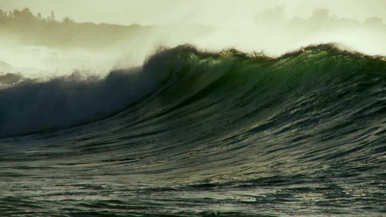 Large waves crest and break in slow motion