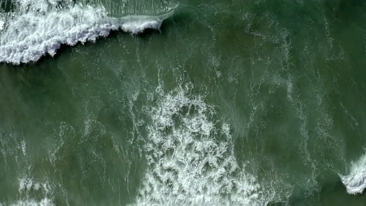 Relaxing Slow Motion Shot of Waves Hitting the Beach