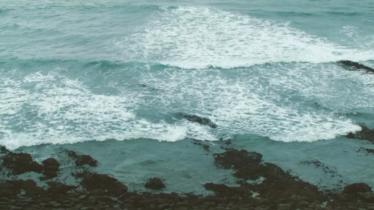 Waves crash on the coast in Portugal's Peniche in Forte da Praia da Consolação