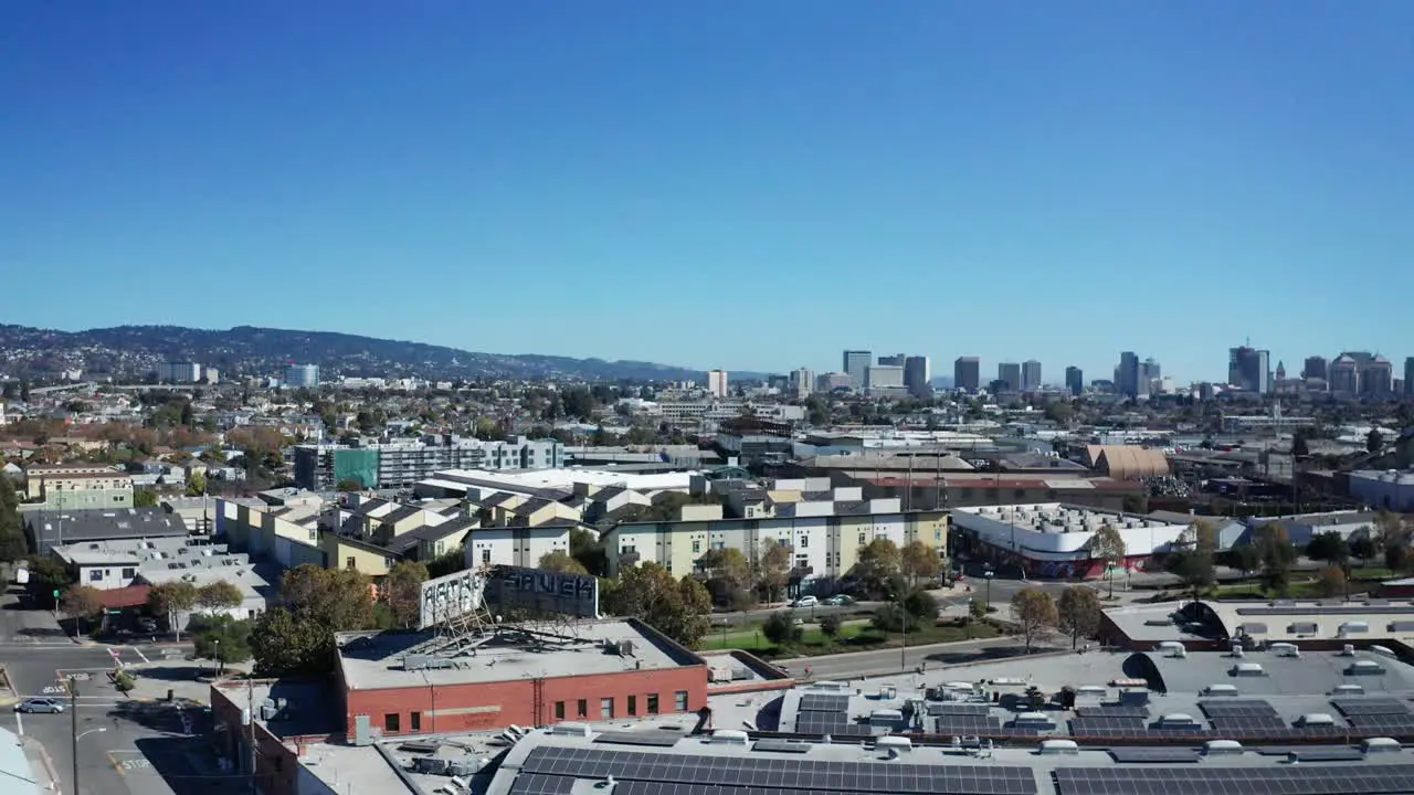 A large City search with business and buildings above a homeless camp