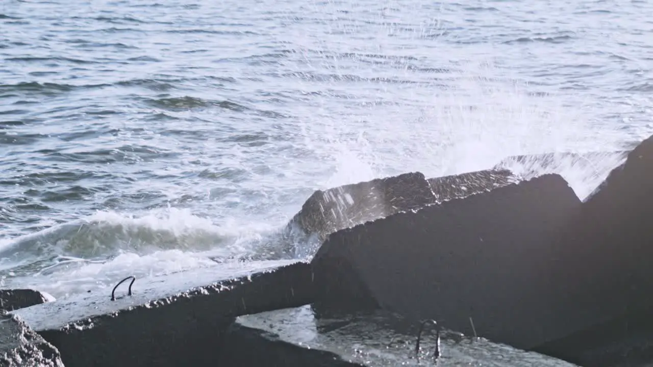 Water rocks Rocks in water Breakwaters on ocean shore Crashing waves