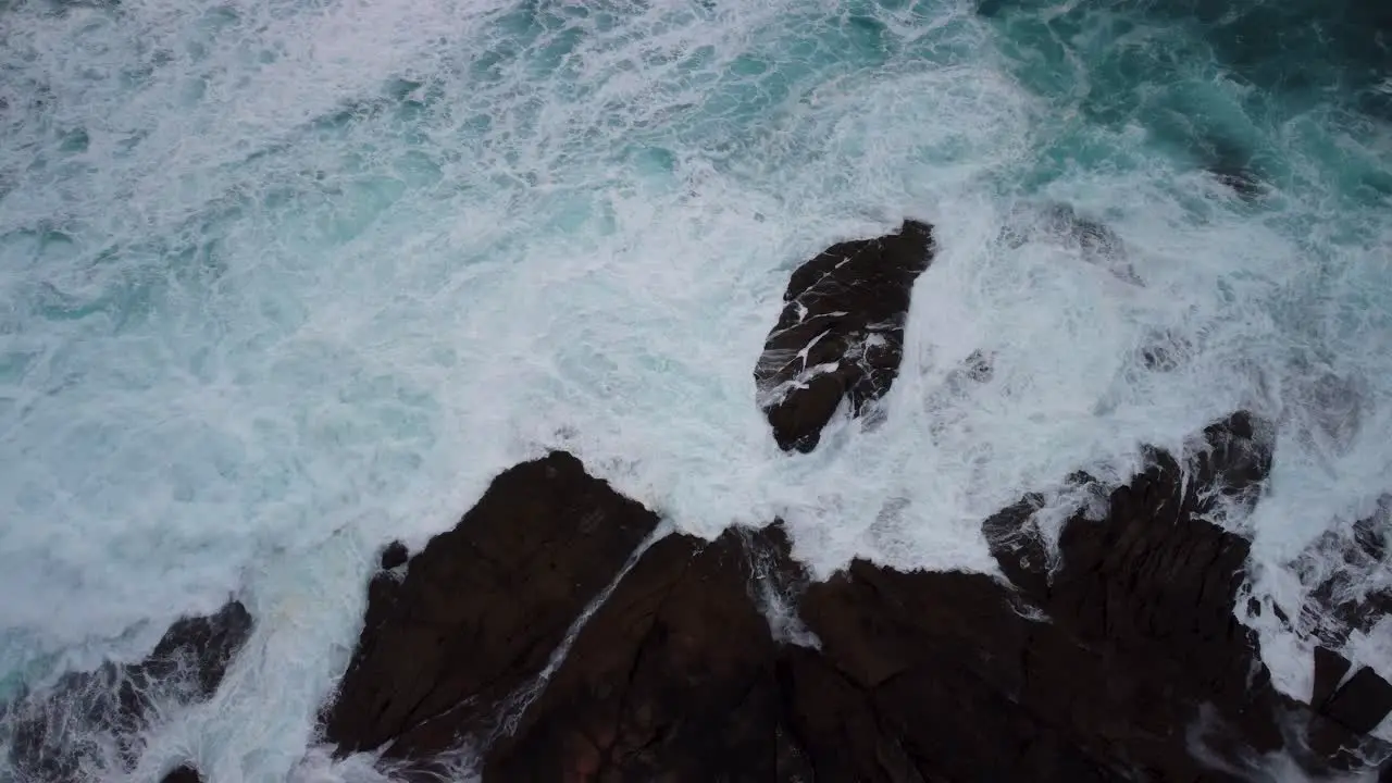 Raging Water With Foamy Waves On The Rocky Shore Of Caion Beach In Coruna Spain