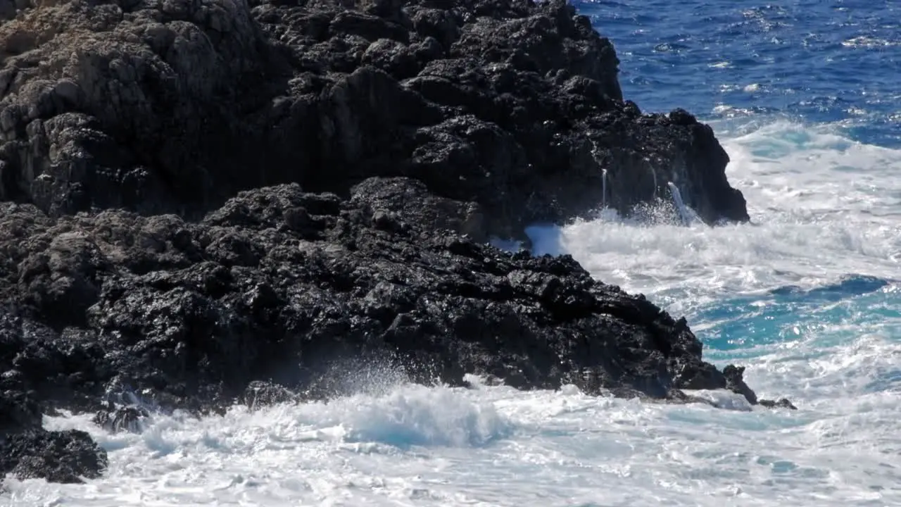 Waves Breaking On Coastal Rocks Forming A Big Spray Jerusalem Beach In Greece close up