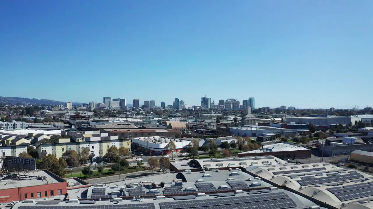 Solar panels on a roof near the urban city and large development