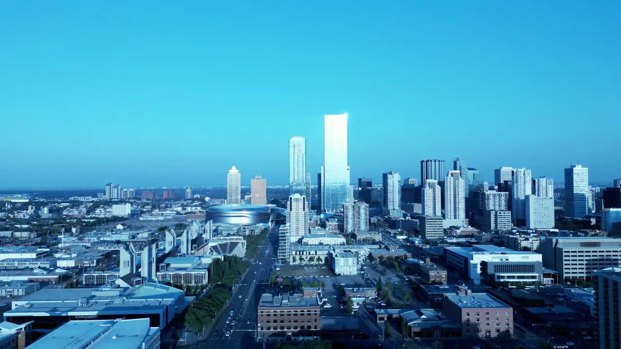 Downtown drone aerial reverse downtown Edmonton Capital City clear hot summer day buildings mirrored reflections of a sunny clear day overlooking MacEwan University campus 104 avenue slow fly over 1-3