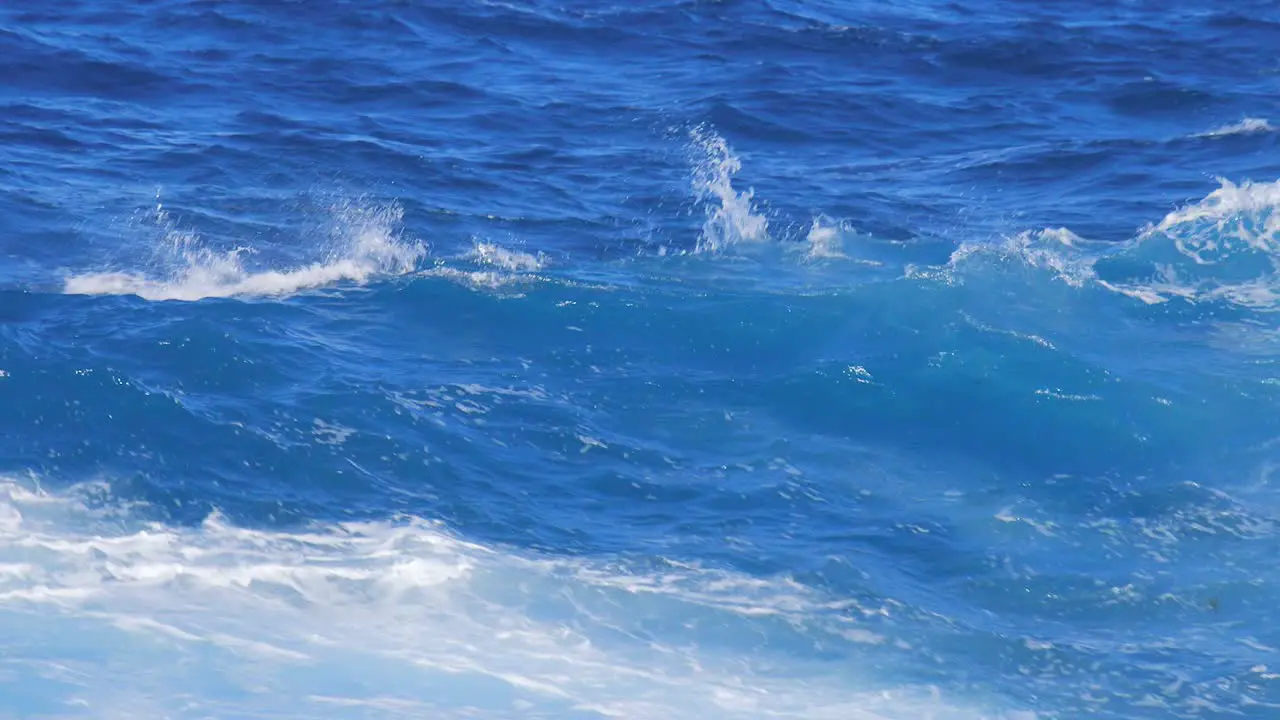 Rough ocean waves breaking on the shoreline of an island in the Caribbean