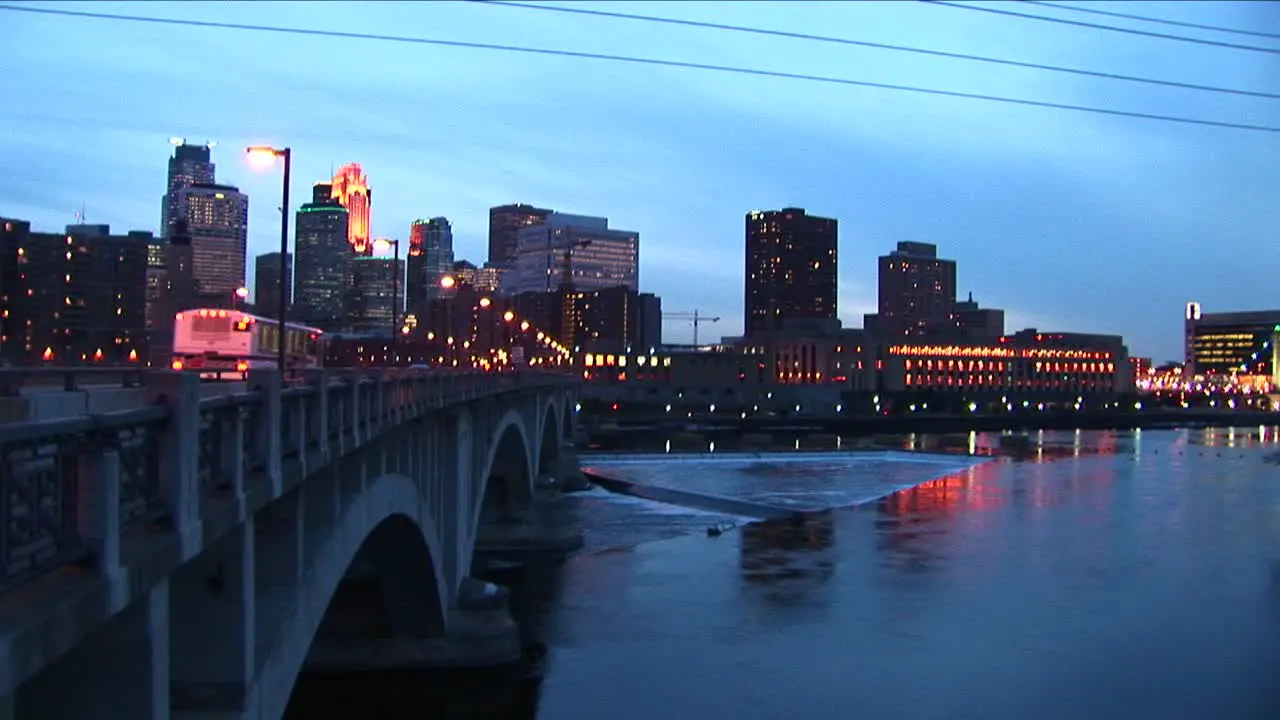 A Picturesque City Skyline At Night With Lights