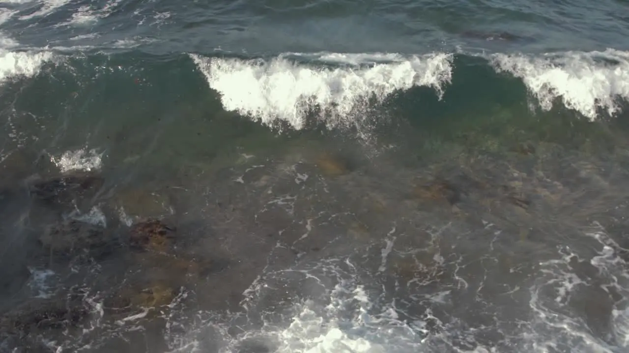 Top down shot breaking waves in slow motion