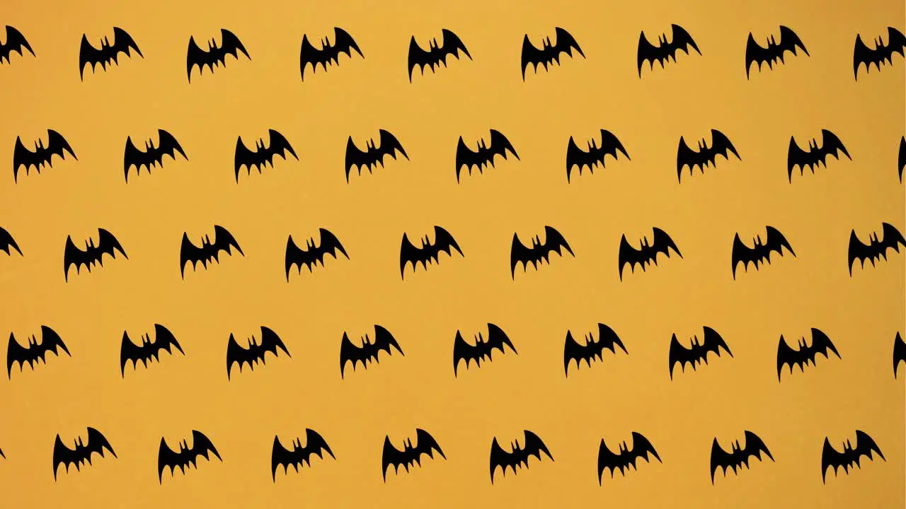 Animation of falling bats on orange background