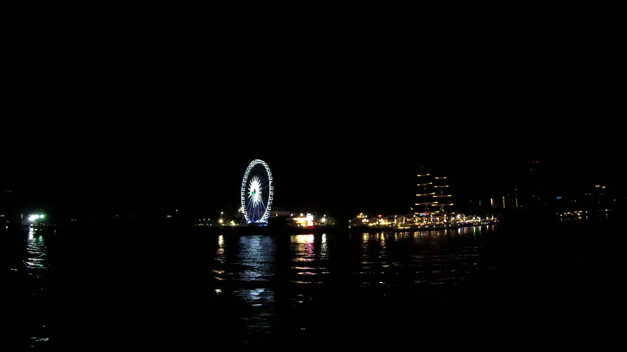 Bangkok City with Chao Praya river at night view from boat in Thailand