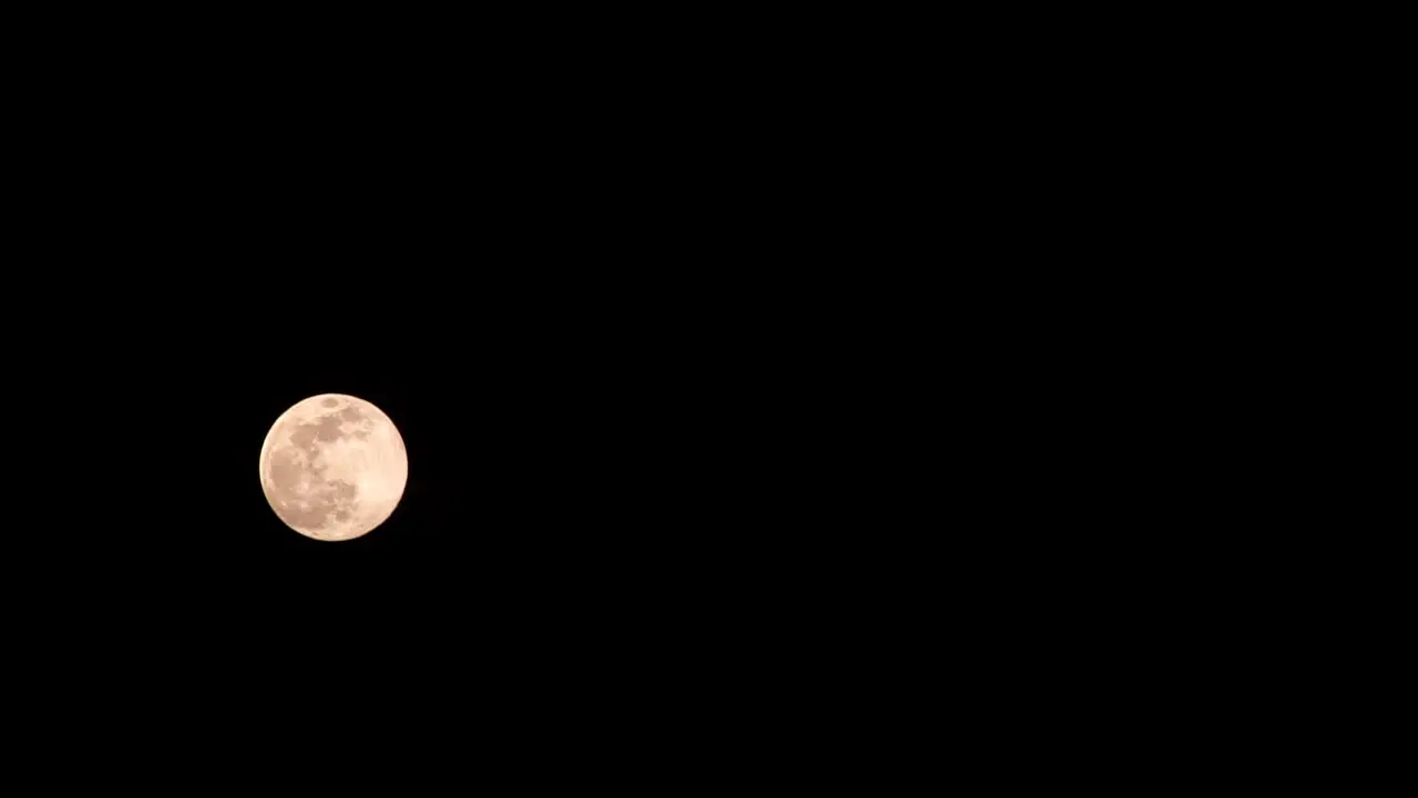 timelapse of a moving full moon with clouds in Cyprus