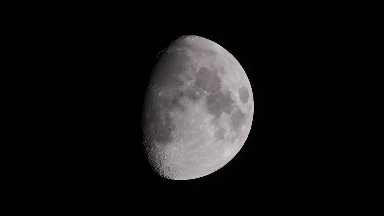 Close Up Waxing Gibbous Three Quarter Moon In Black Night Sky HD