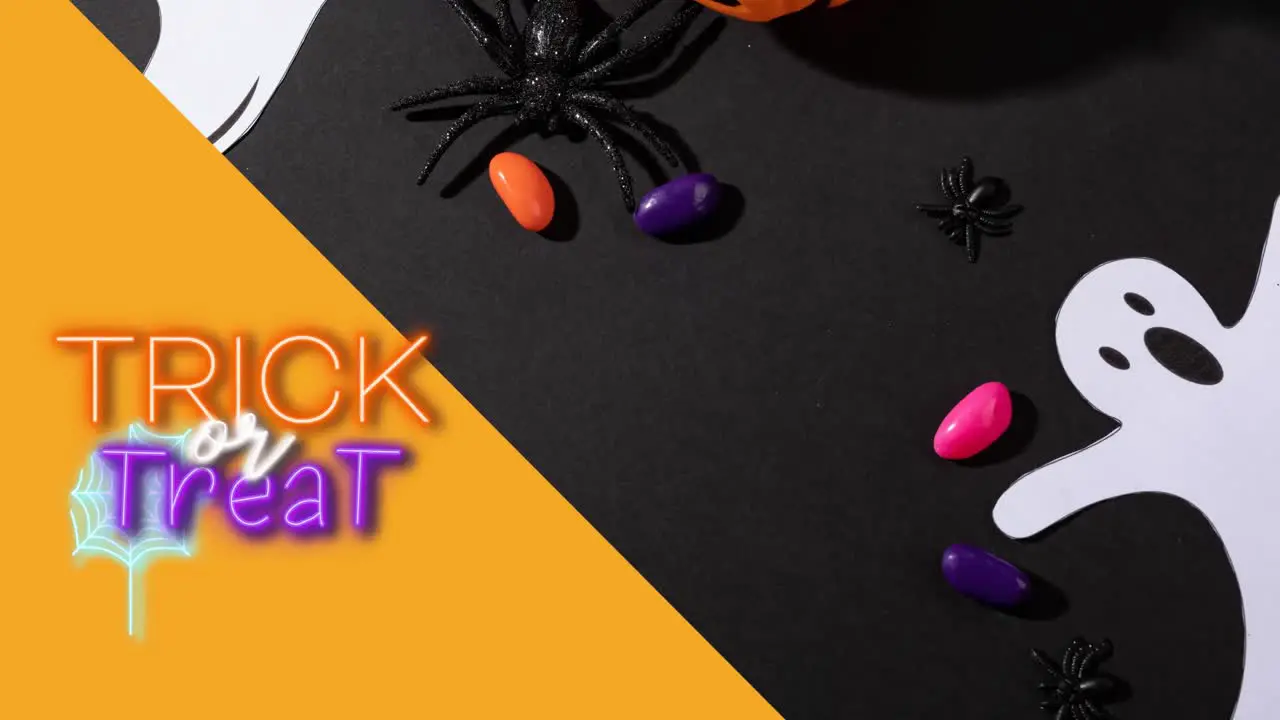 Animation of trick or treat text over sweets