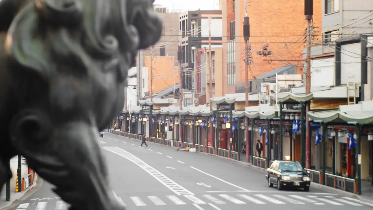 Slide shot of the city early in the morning in Kyoto Japan 4K slow motion