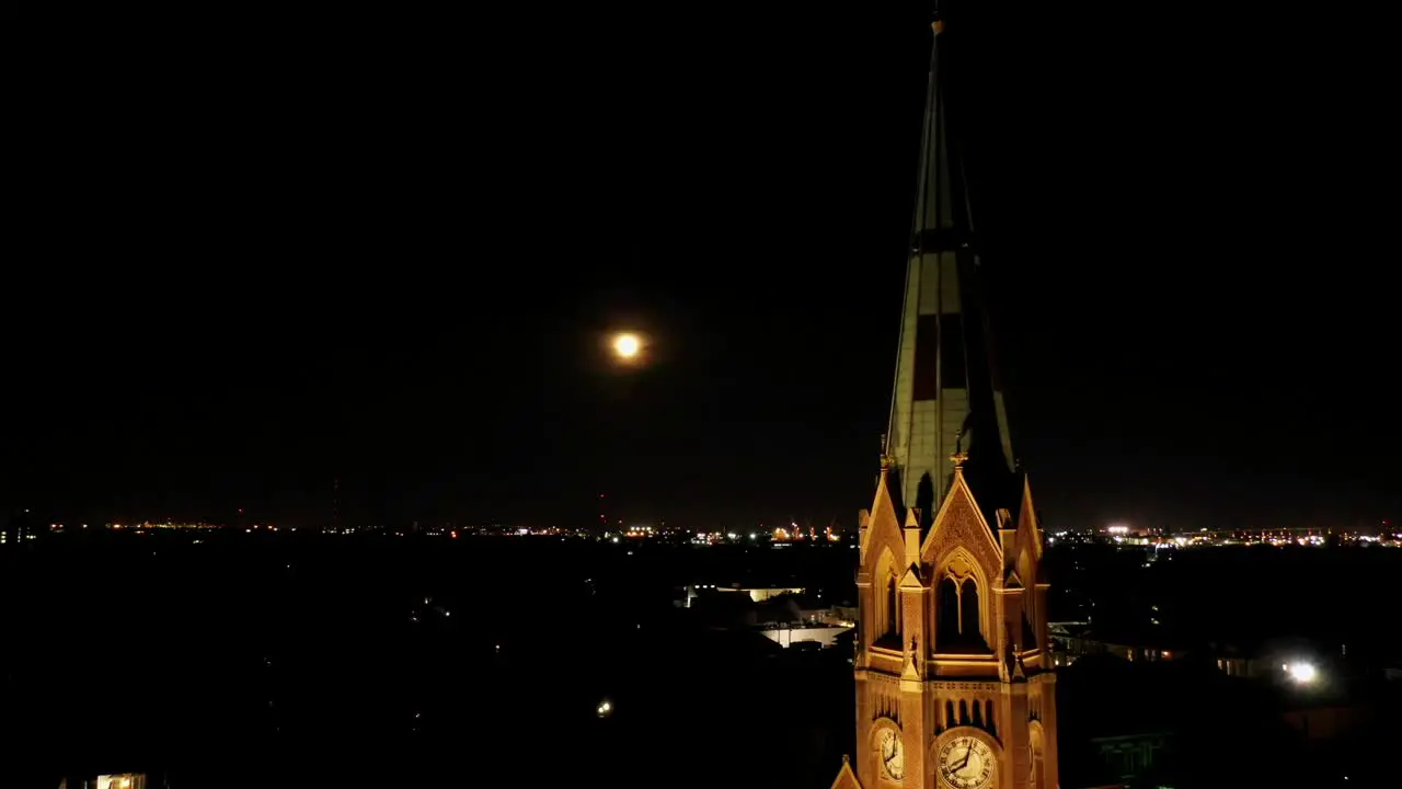 Friday the 13th full moon night revealed past a beautiful church steeple