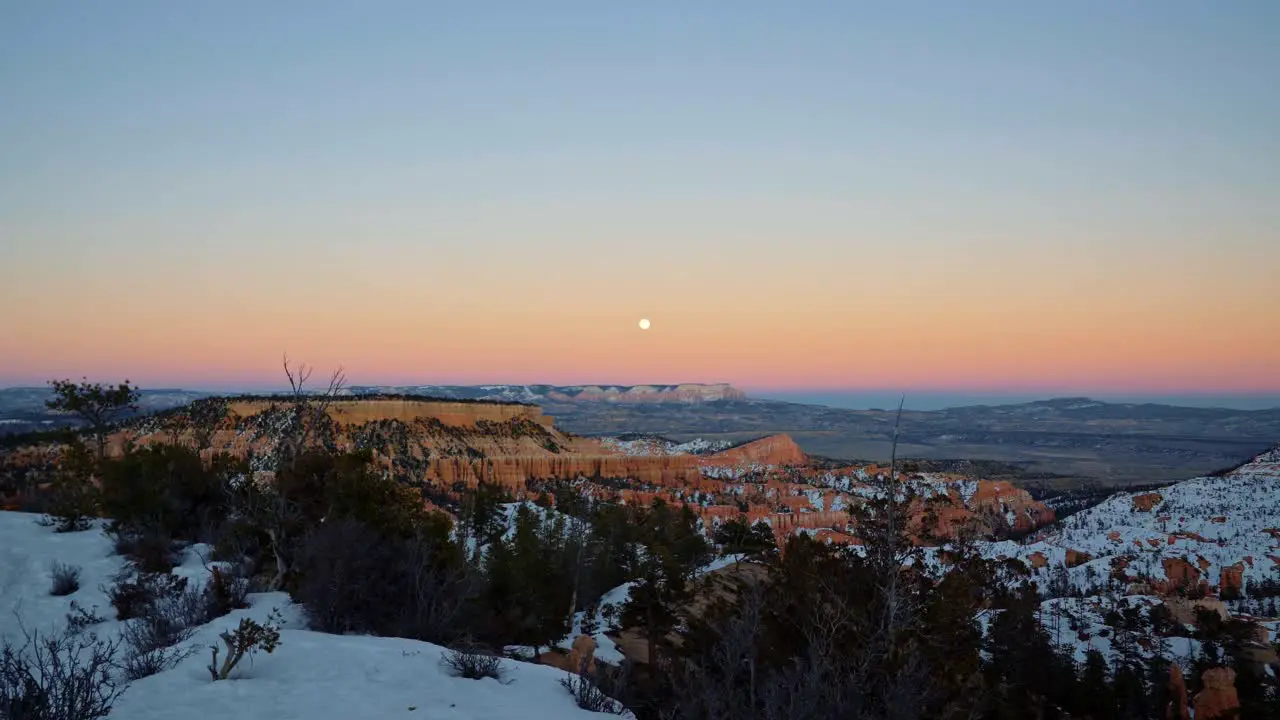 Stunning winter sunset looking out to the famous natural amphitheater in Bryce Canyon National Park Utah