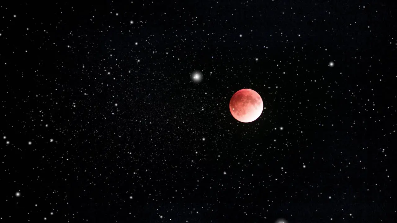 red moon or blood moon studded with stars in space the universe