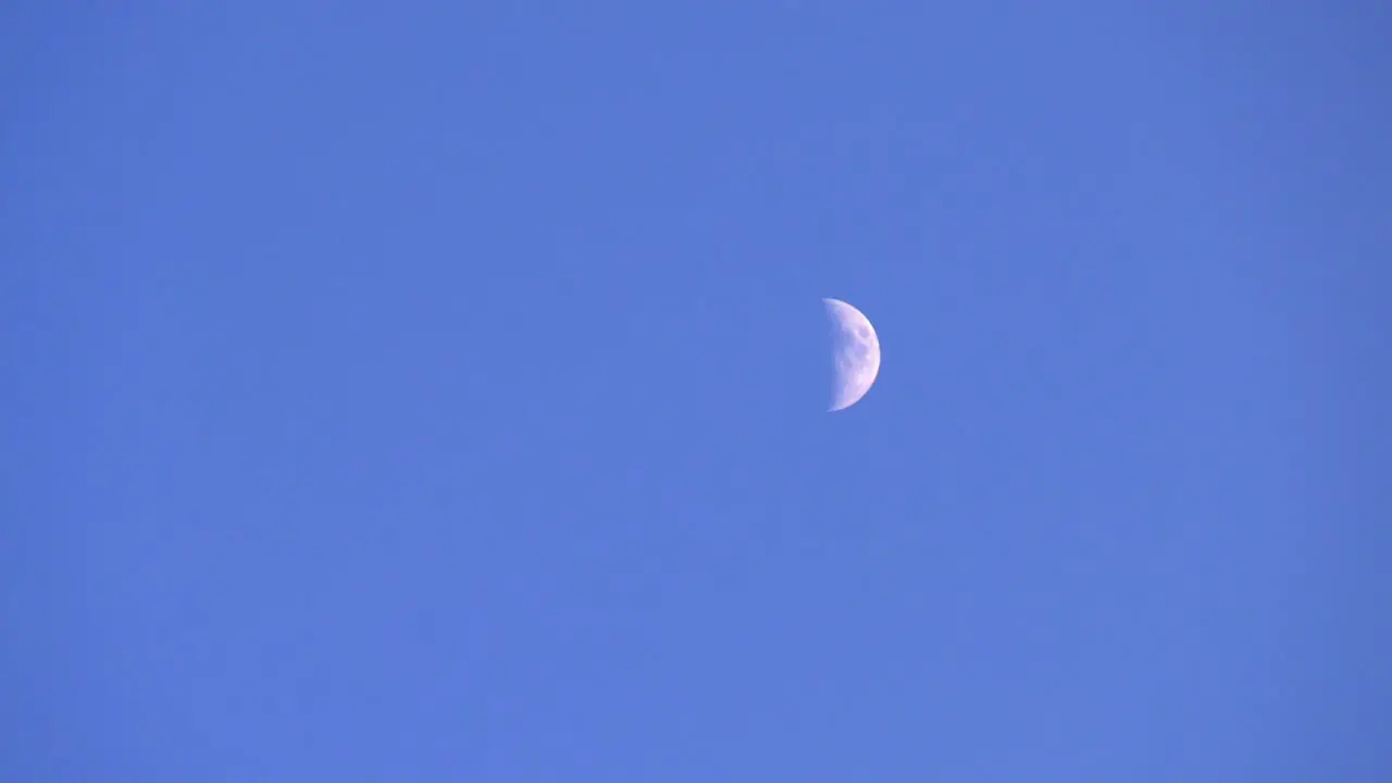 Zoom Out Shot from the Moon Finishes with a Beautiful Shot of Rocky Mountains in the Foreground