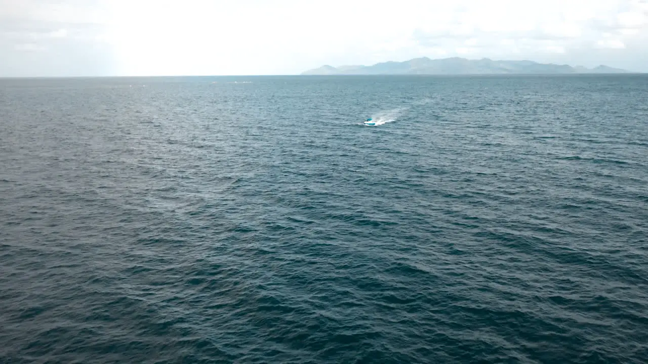 A boat sailing across the ocean