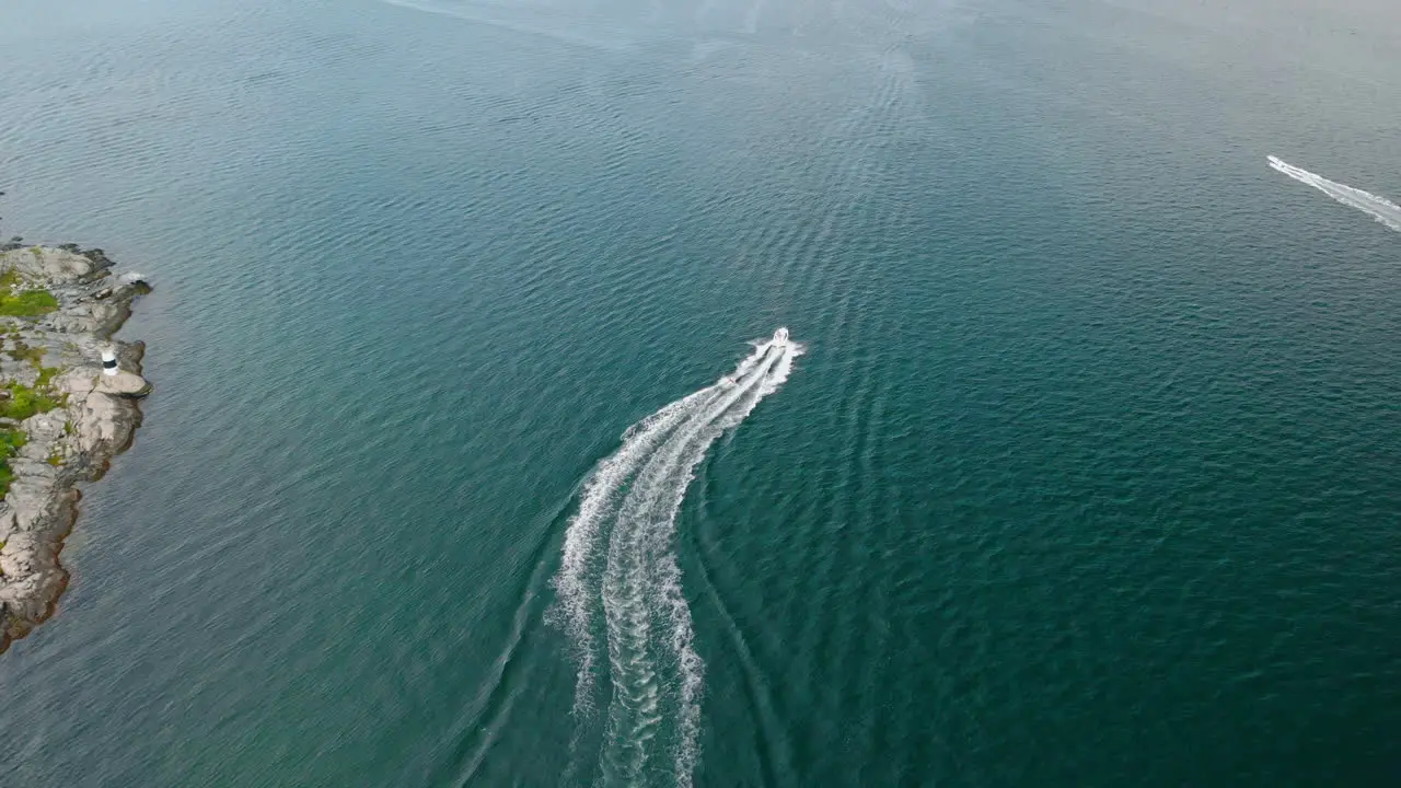 Motor boat speeding over the ocean