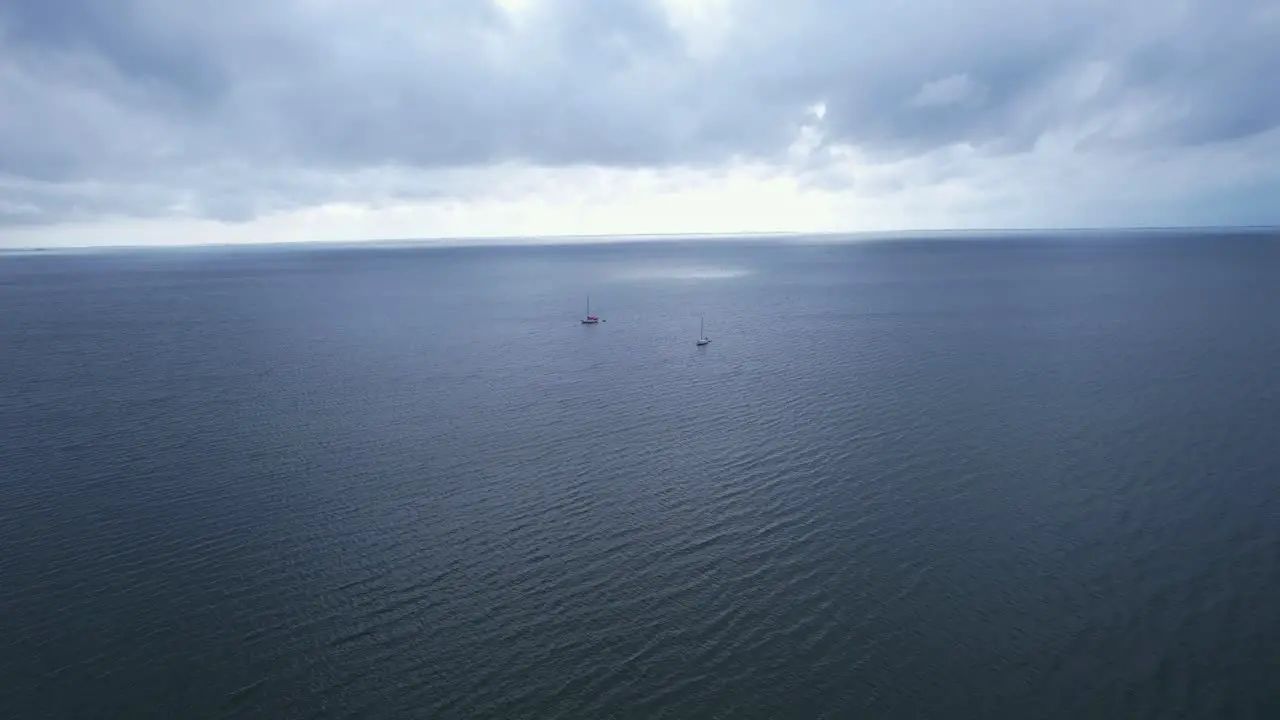 Aerial approach of boats in open seas at Port St