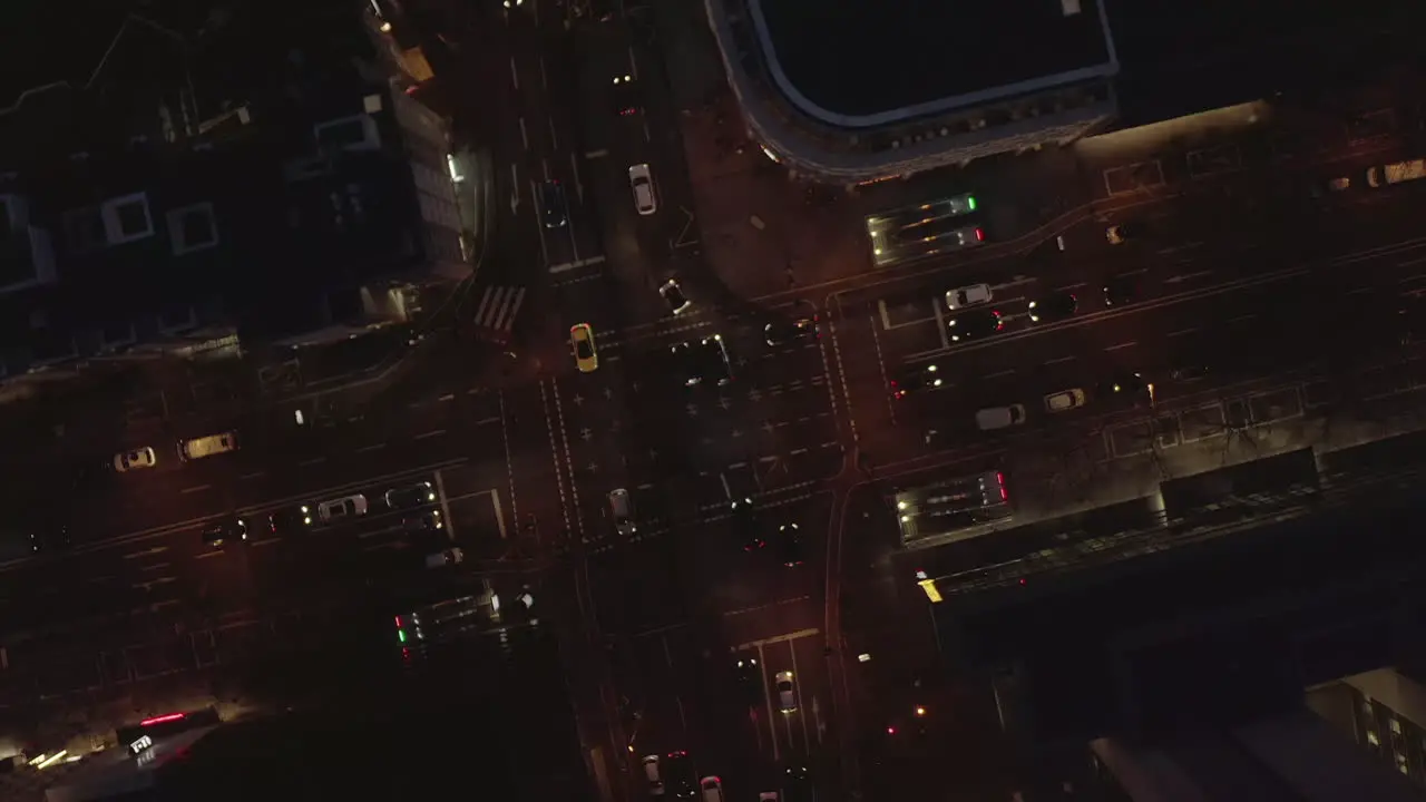 AERIAL Night flight towards big intersection in Cologne Germany