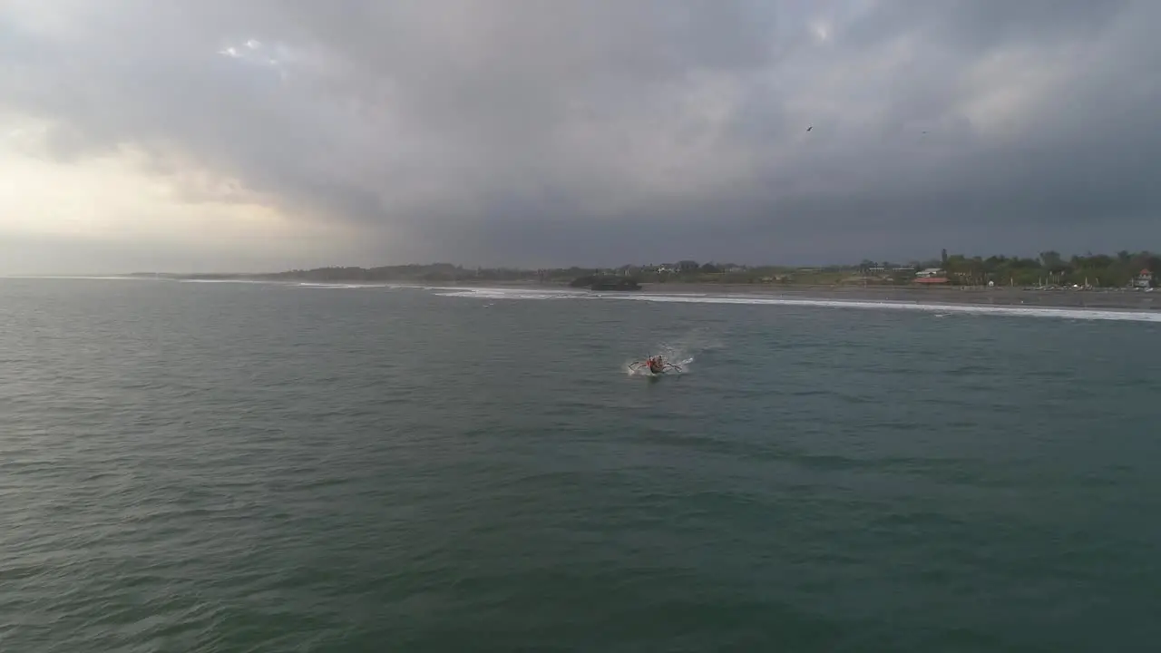 Fishing Canoe Leaving Indonesian Shore