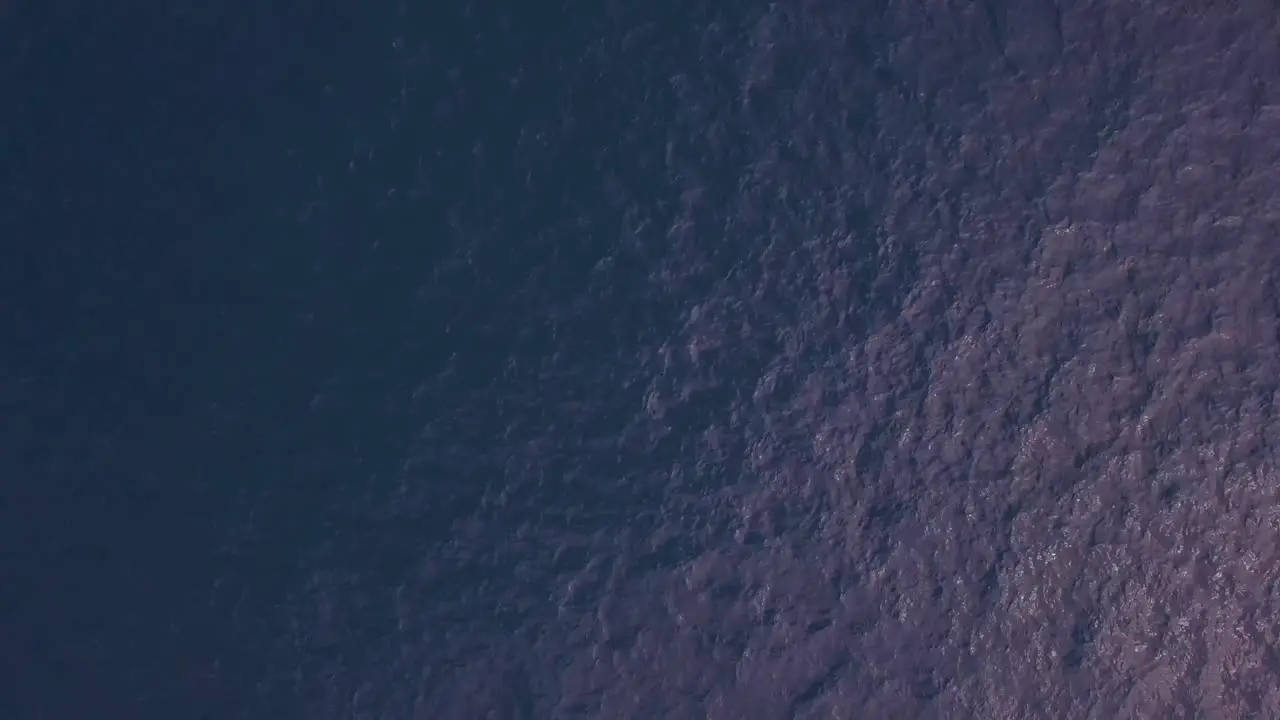 Birds eye view shot of waves in Iceland