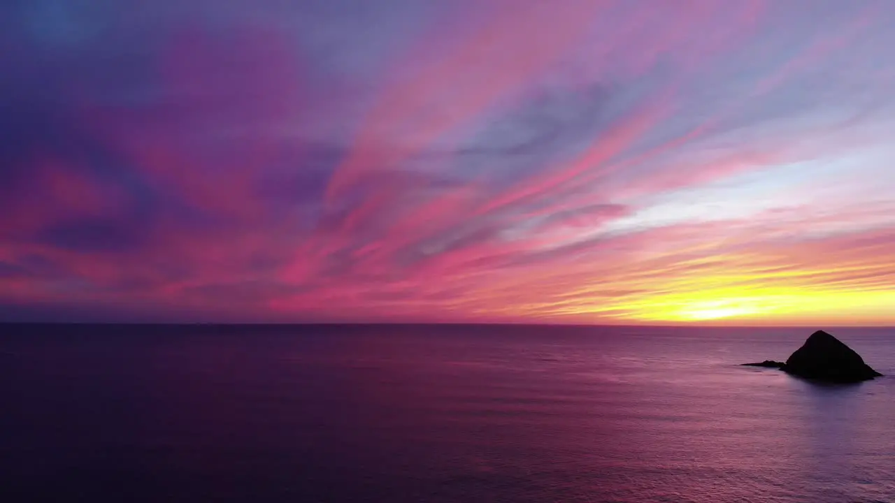 Drone looking at beautiful sunset at the beach