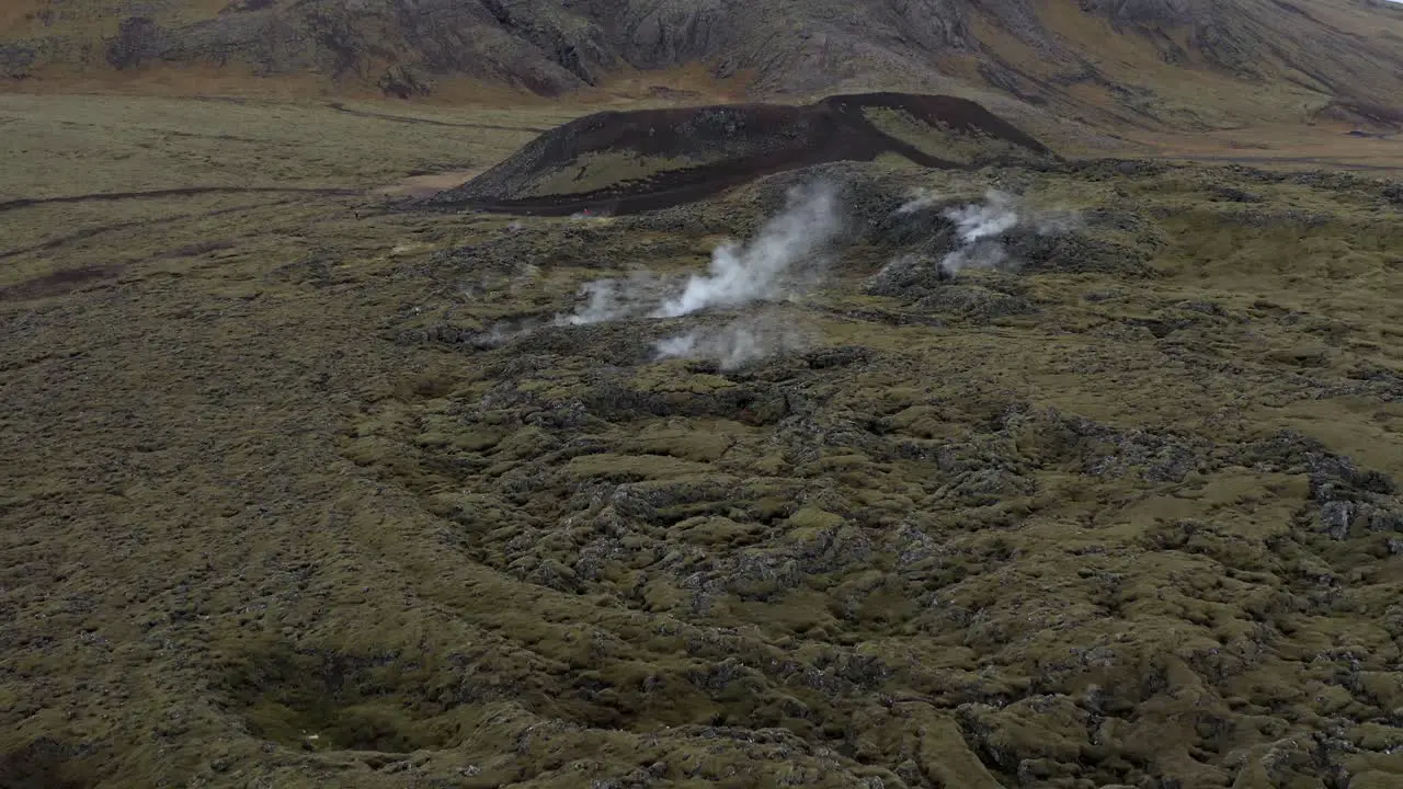 Sulfur gas erupting from crevice in volcanic Icelandic surface aerial