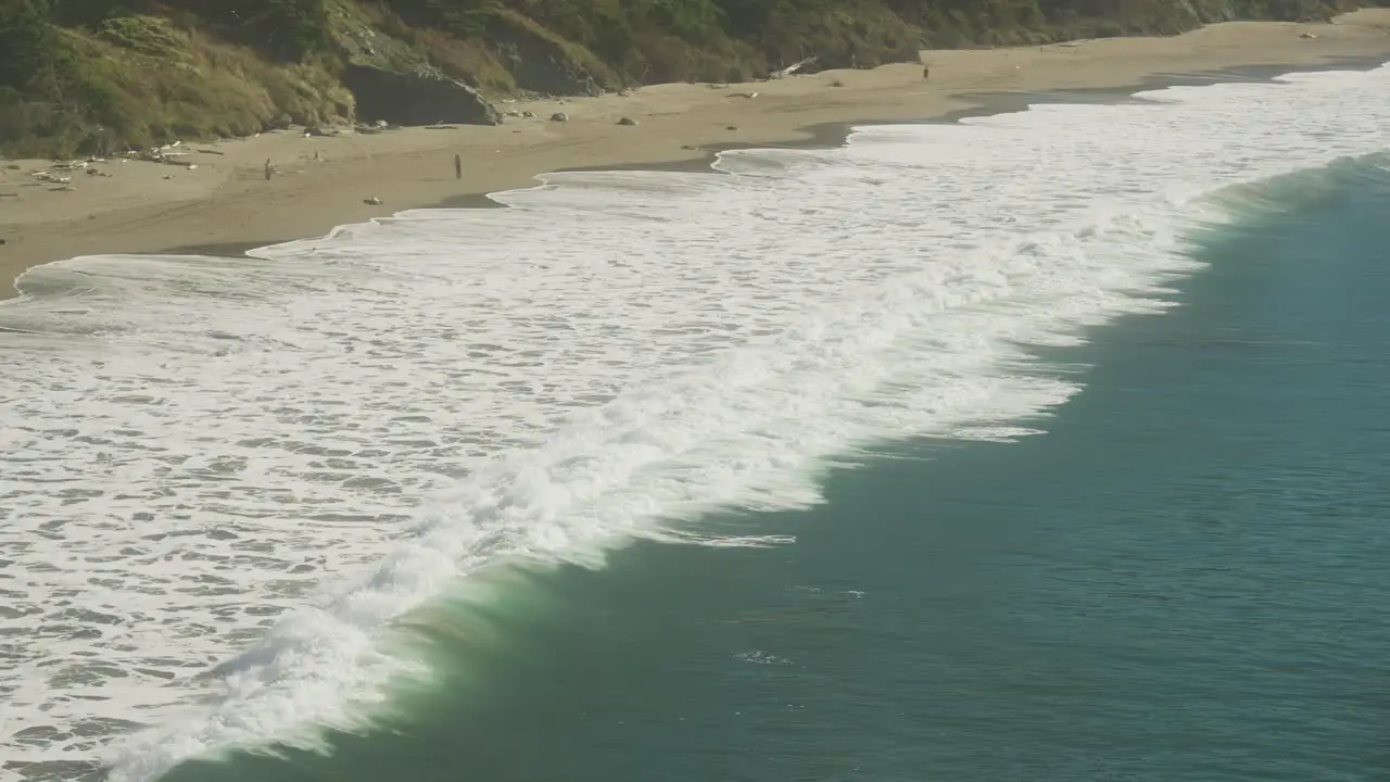 Slow motion of powerful wave breaking on shore of Port Orford Bay