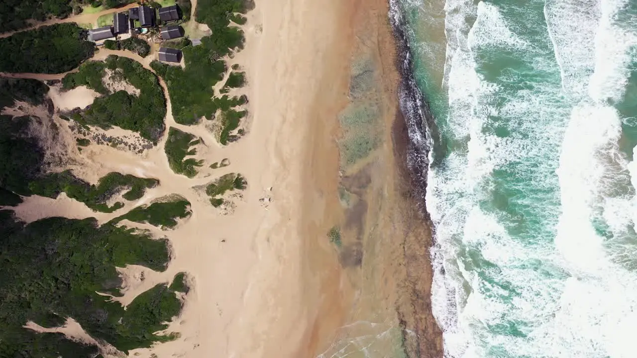 Birds Eye Forward Flying Shot of Chidenguele Beach in Mozambique