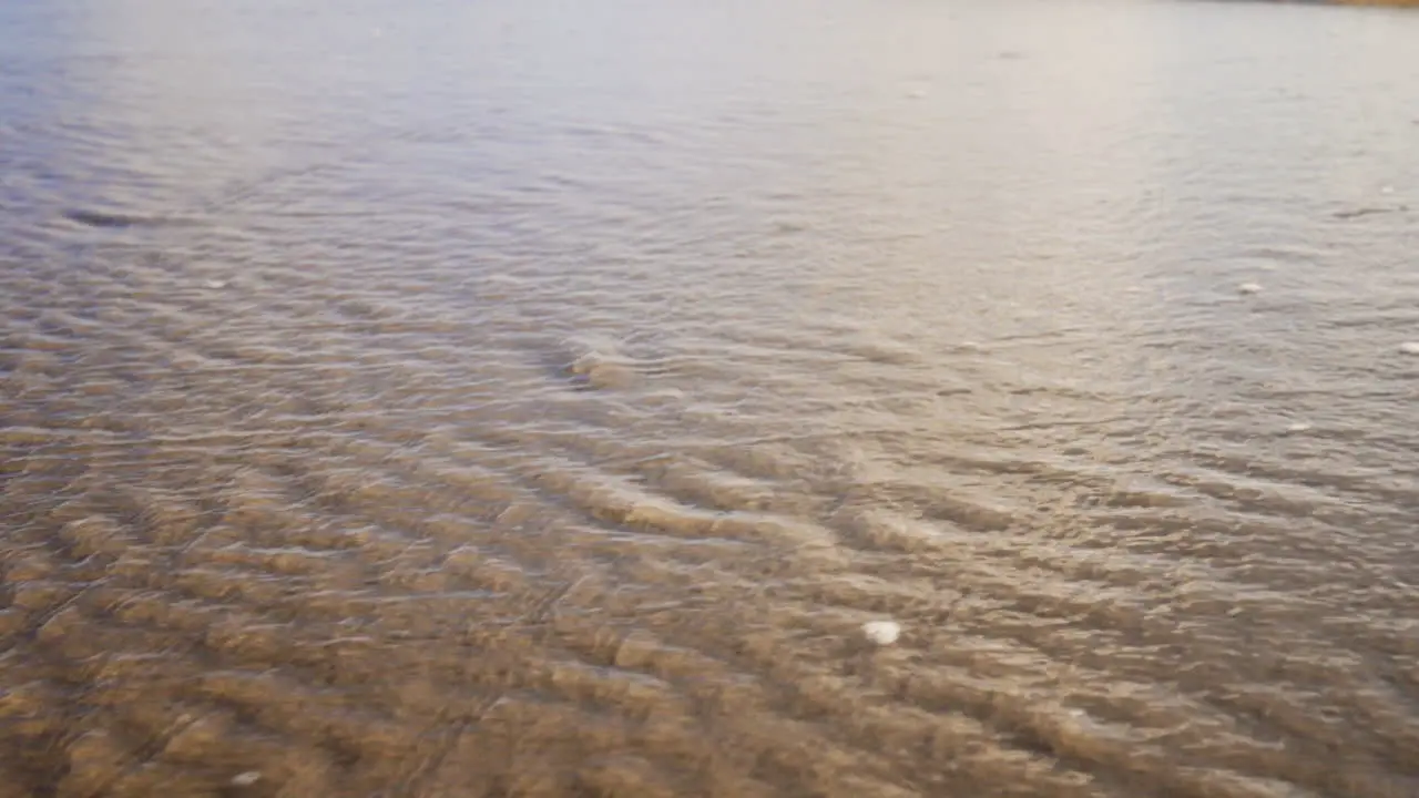 Wrinkles in the sand after a wave