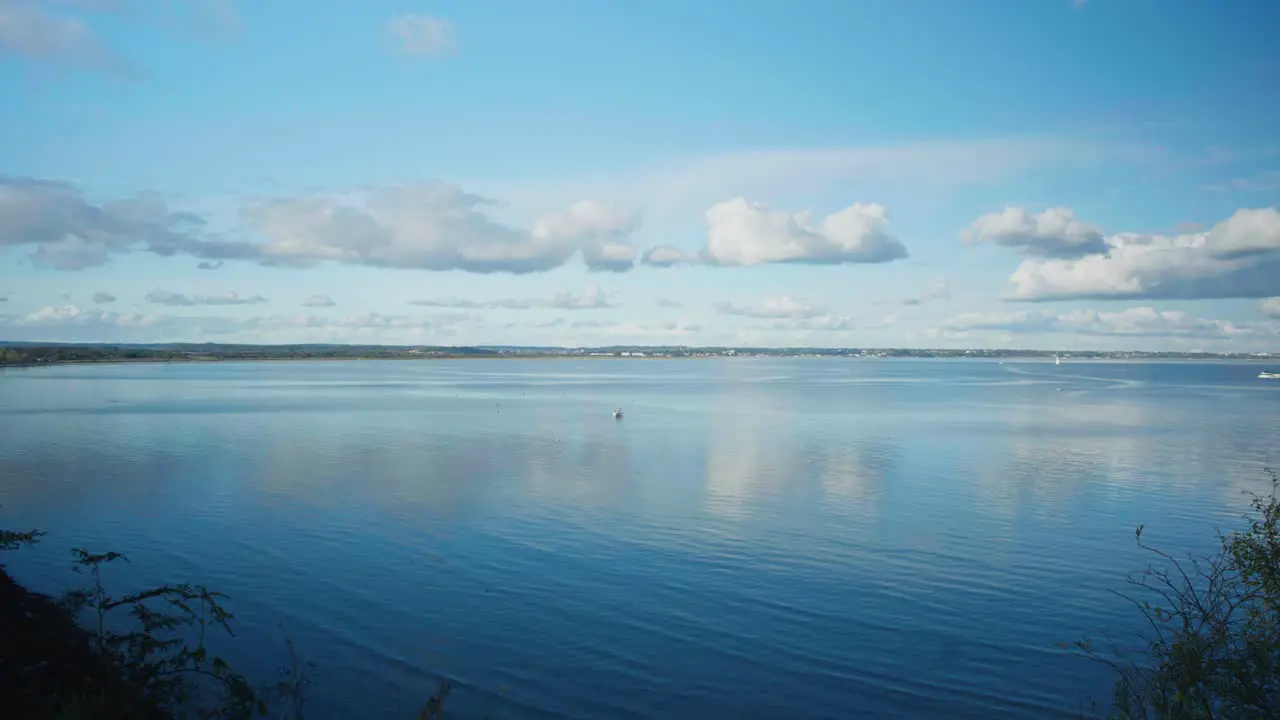 4K Landscape panoramic view shot of the beautiful southern English coast line during sunset at Old Harry Rocks in Dorset