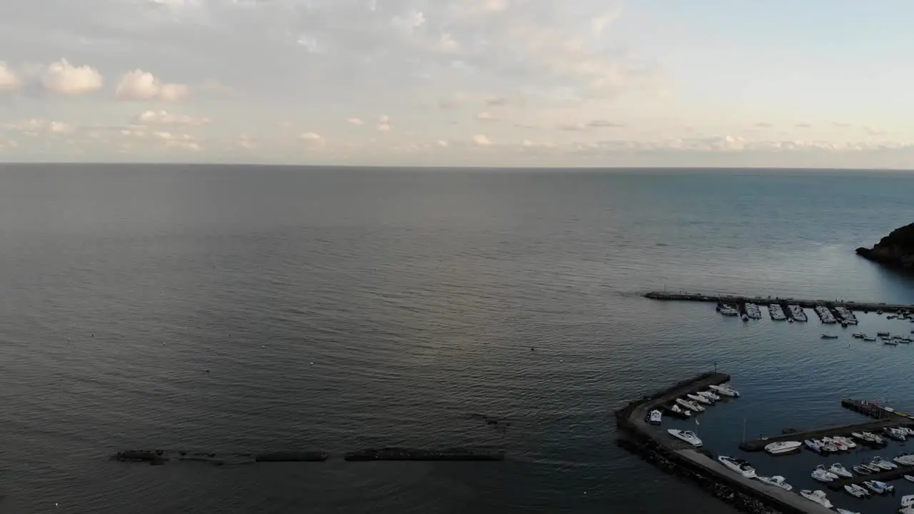 Pull Back Drone shot at sunset sea Scauri Marina di Minturno full HD 50 fps