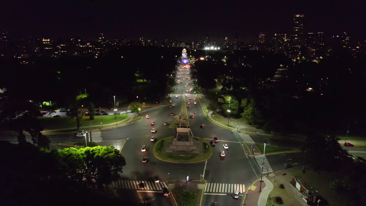 Aerial view of the Urquiza Monument at night with the main avenue with constant car traffic Palermo Buenos Aires Argentina