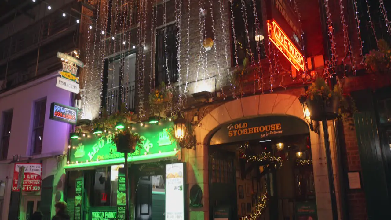 Tilt shot Old warehouse in Crown Alley at Christmas season at night in Dublin Ireland