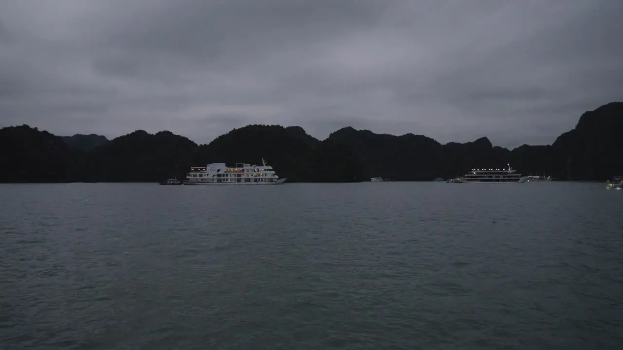 Nighttime shot of a cruise ship anchored in Ha Long Bay Vietnam