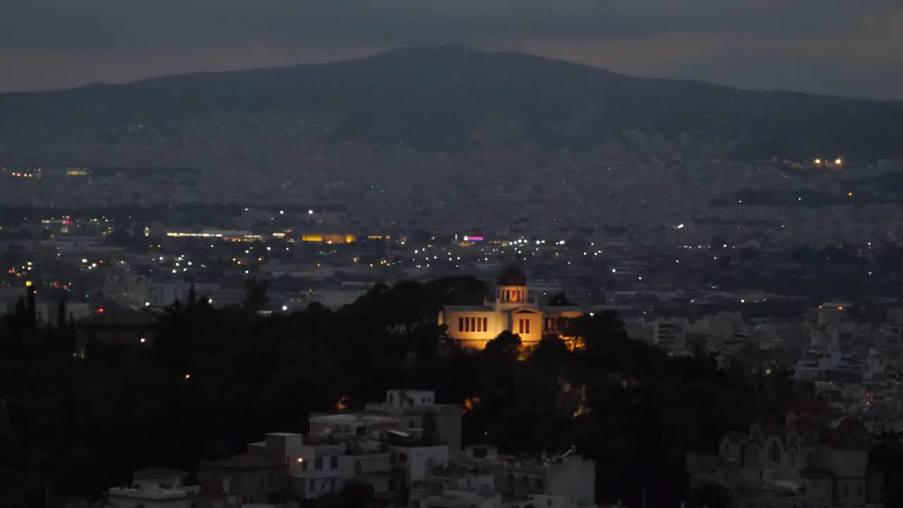 Tripod shot of the city skyline in the night of Athen in Greece