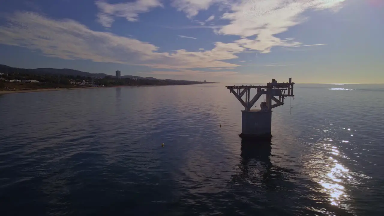 Aerial view of sunrise at Marbella near the abandoned overhead sea cable