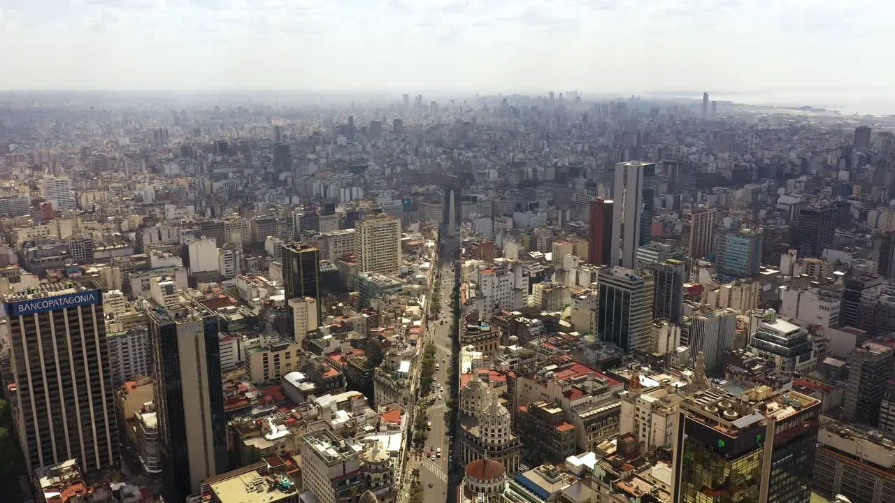 Slow wide aerial pan of Buenos Aires cityscape with Obelisco visible